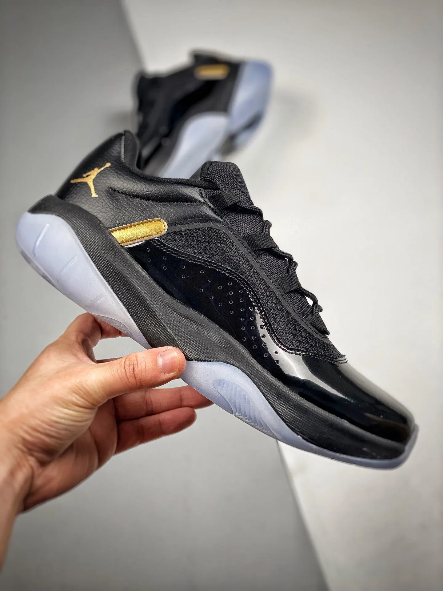 Air Jordan 11 CMFT Low Black/Metallic Gold