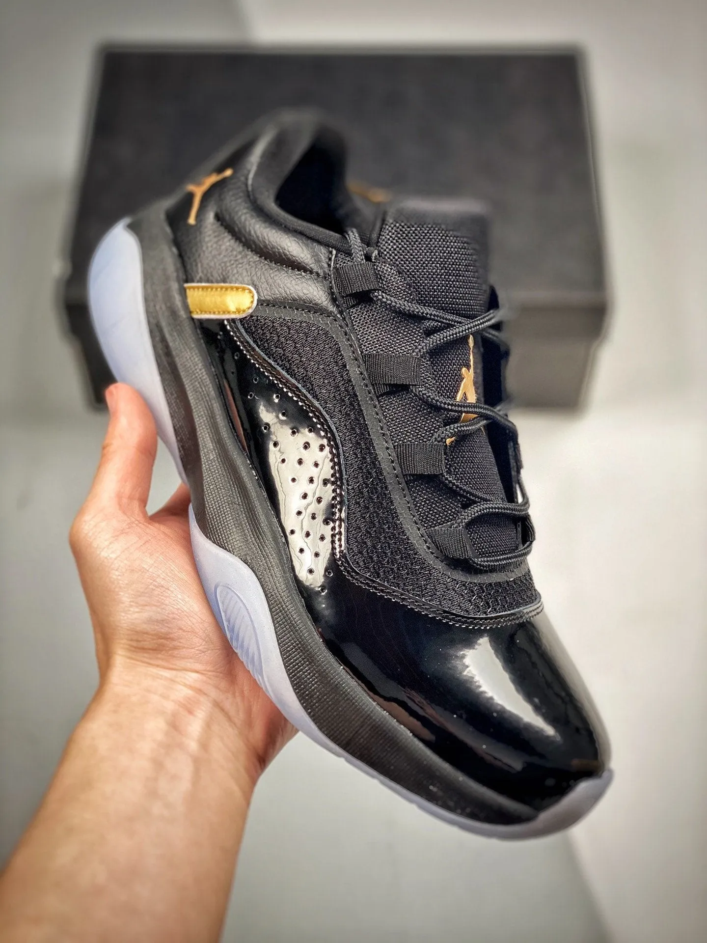 Air Jordan 11 CMFT Low Black/Metallic Gold