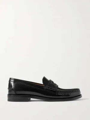 Black leather loafers