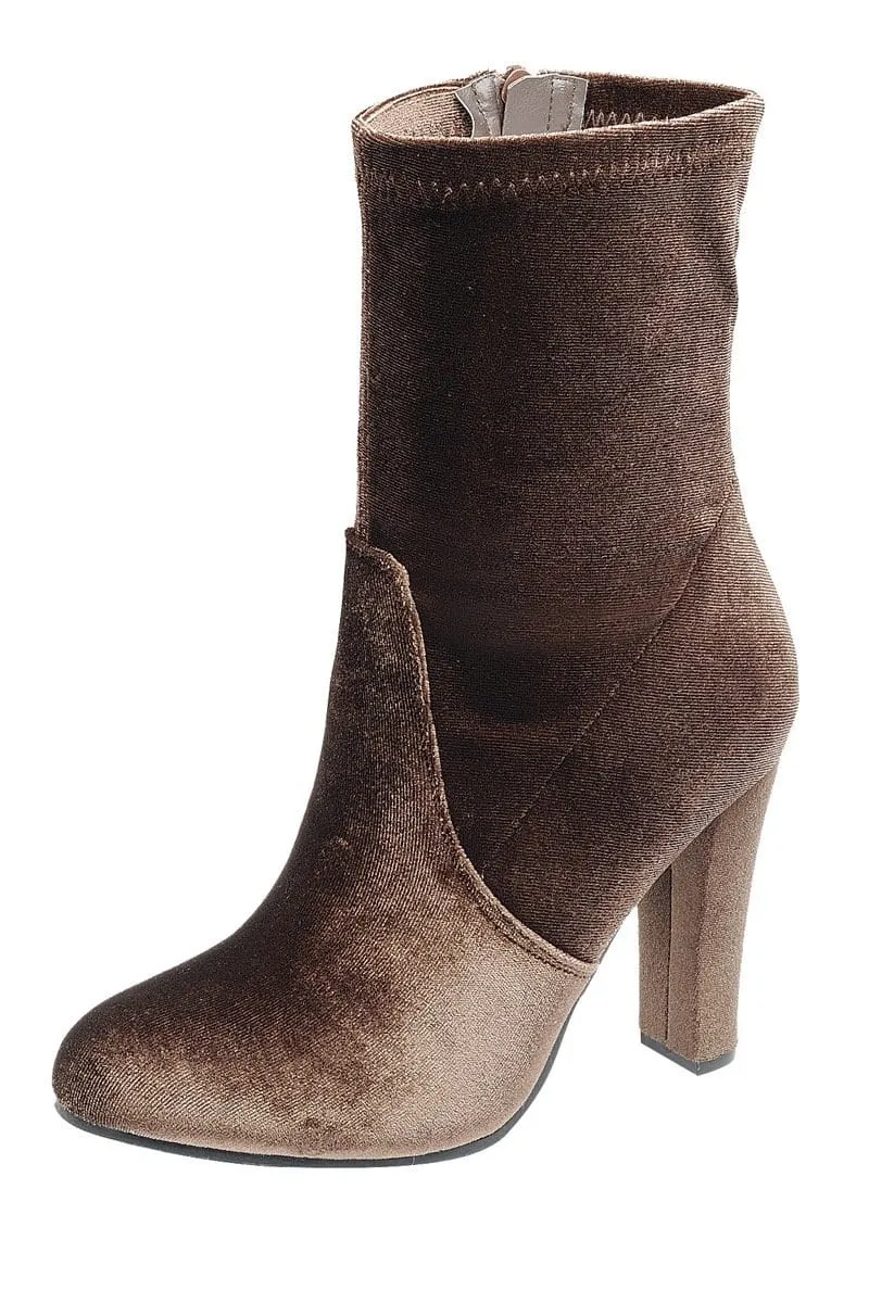 Ladies fashion reflections of sock-like ankle boot, closed almond toe, block heel, zipper closure