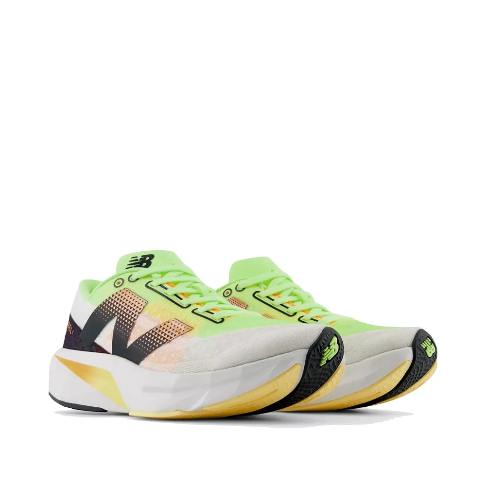 New Balance Women's FuelCell Rebel v4 Sneaker in White with Bleached Lime Glo and Hot Mango